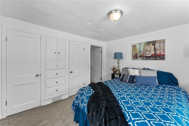 bedroom featuring carpet flooring