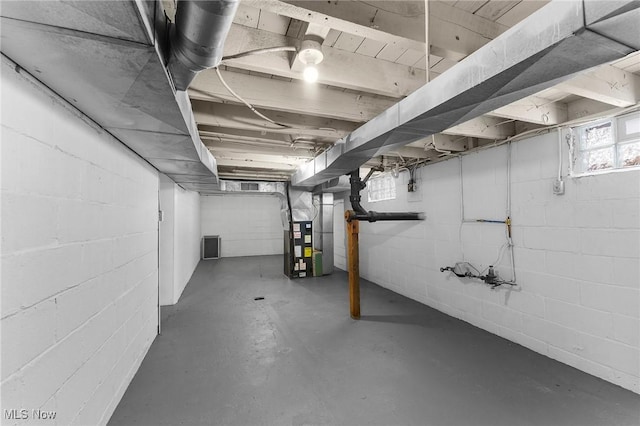 basement featuring heating unit