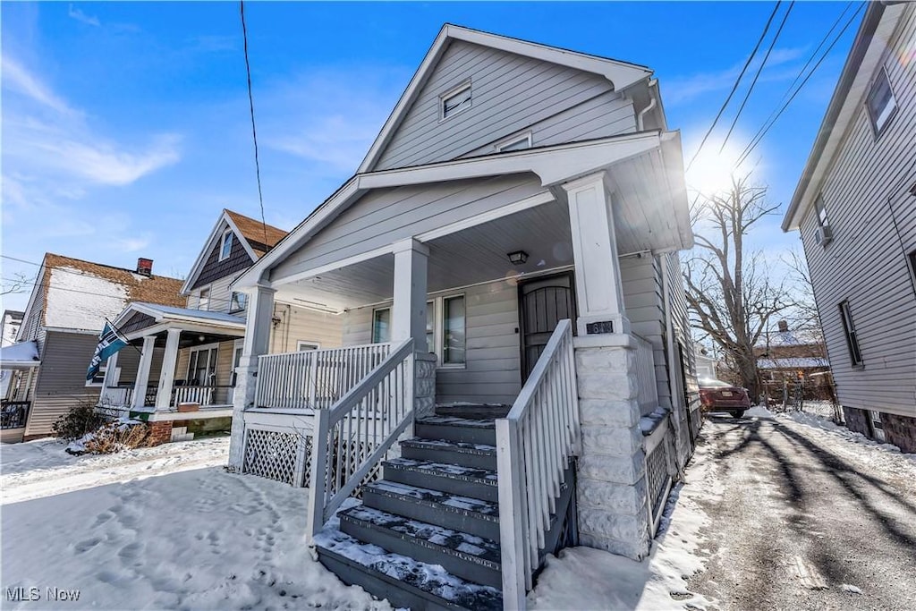 bungalow-style home with covered porch