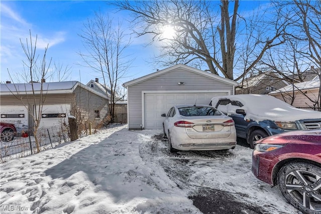 view of snow covered garage