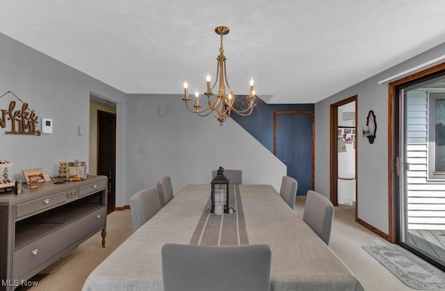 carpeted dining area featuring a chandelier and a healthy amount of sunlight