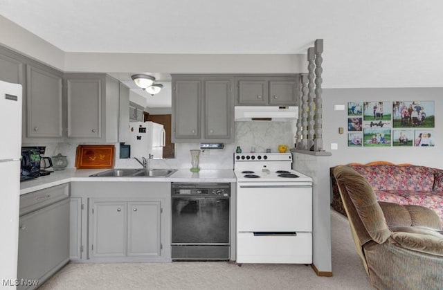 kitchen featuring white appliances, gray cabinets, and sink