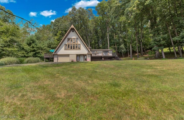 view of yard featuring a wooden deck