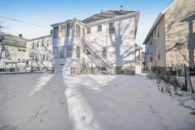 view of snow covered property