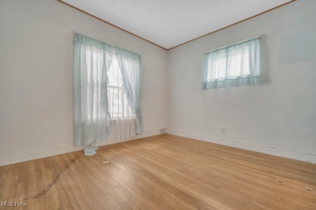 empty room featuring hardwood / wood-style flooring