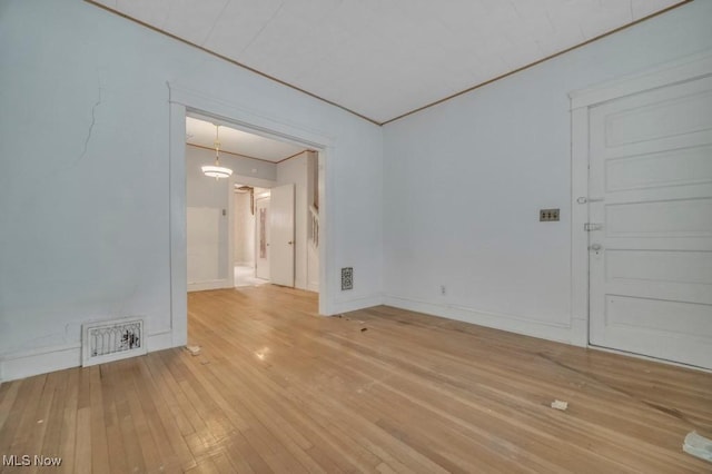 empty room featuring hardwood / wood-style floors