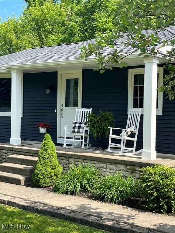 doorway to property with a porch