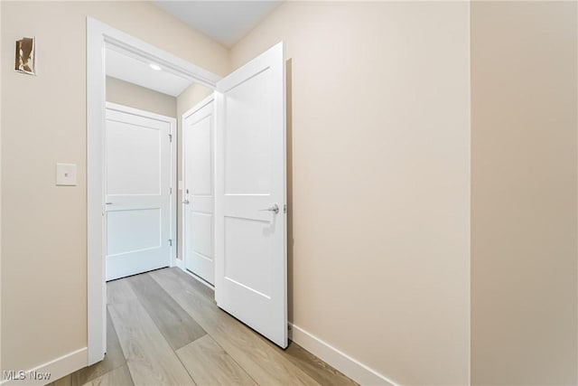 hallway featuring light wood-type flooring