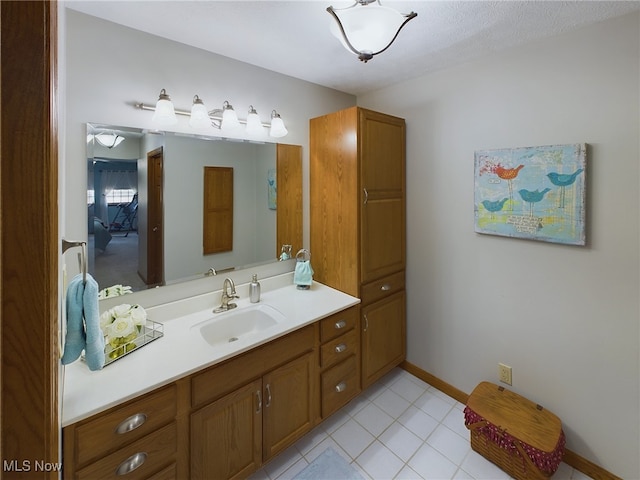 bathroom with vanity and tile patterned flooring