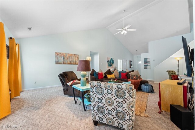 living room featuring ceiling fan, light carpet, and vaulted ceiling with beams