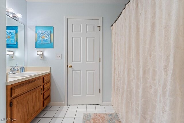 bathroom featuring vanity and tile patterned floors