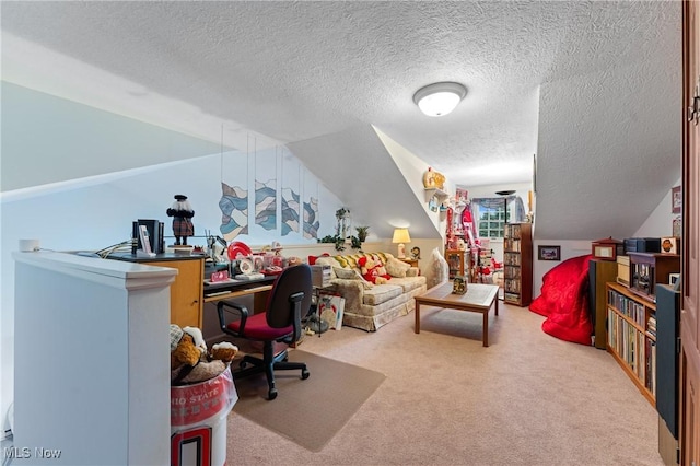 carpeted office space featuring a textured ceiling and lofted ceiling