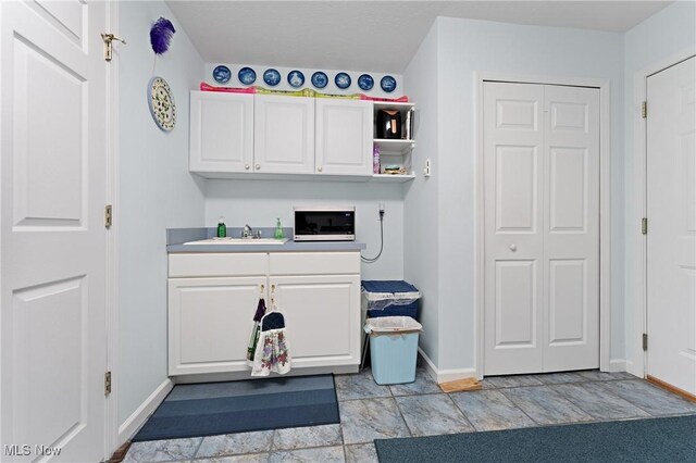 laundry room featuring sink