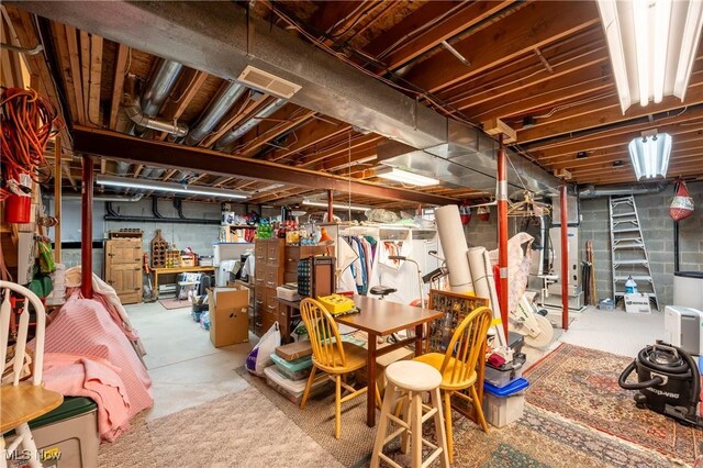 basement featuring water heater