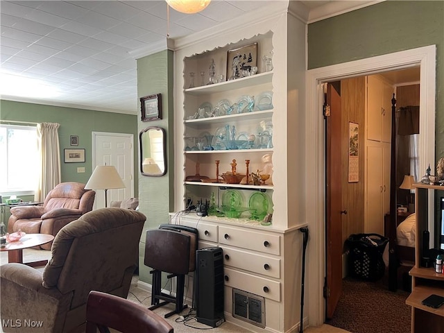 interior space featuring crown molding