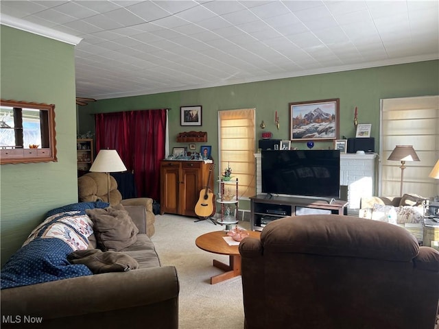 living room featuring light carpet and crown molding