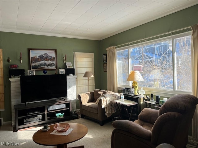 living room featuring light colored carpet and crown molding