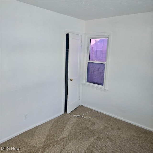 view of carpeted empty room