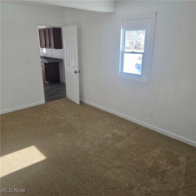 view of carpeted spare room