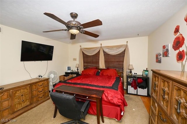 bedroom featuring ceiling fan