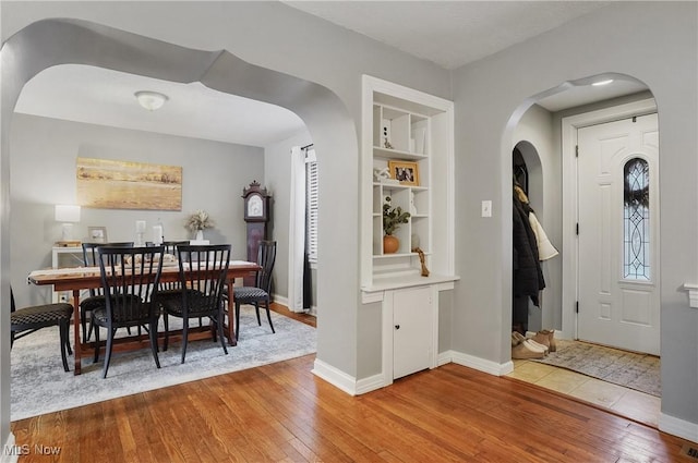 foyer entrance featuring wood-type flooring