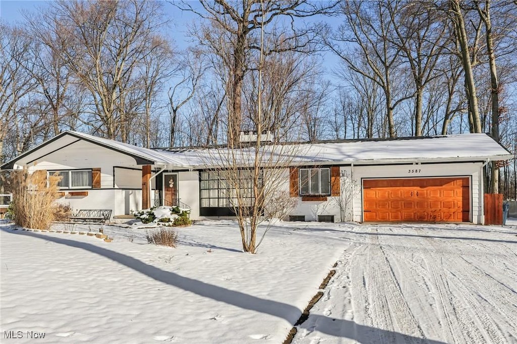 ranch-style house with a garage