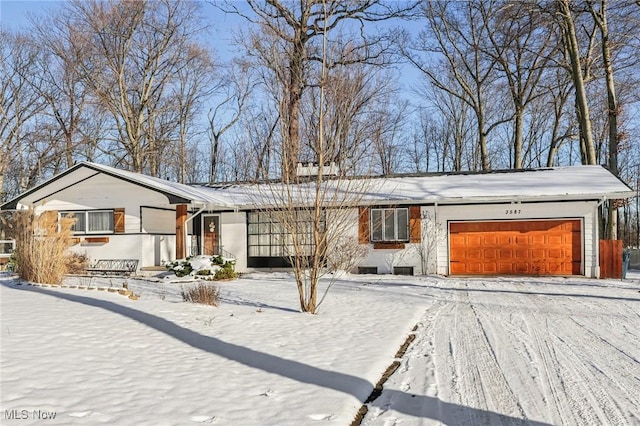 ranch-style house with a garage