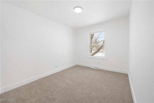 view of carpeted spare room