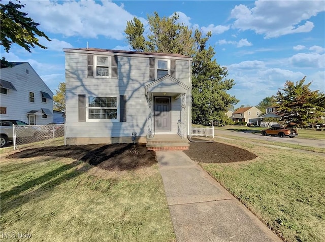 view of front facade with a front yard