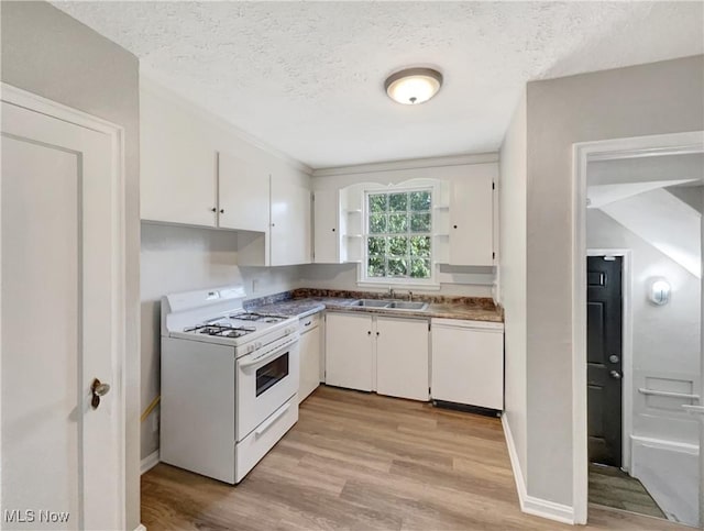 kitchen with sink, white cabinets, a textured ceiling, white appliances, and light wood-type flooring