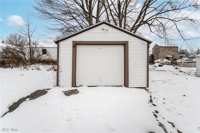 view of snow covered garage