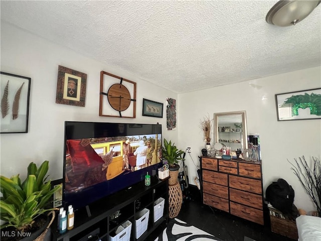 miscellaneous room featuring a textured ceiling