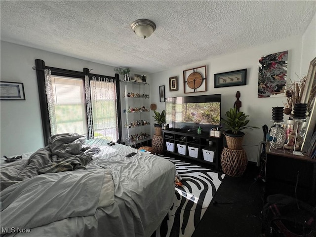 bedroom with a textured ceiling