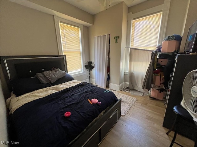 bedroom featuring light wood-type flooring