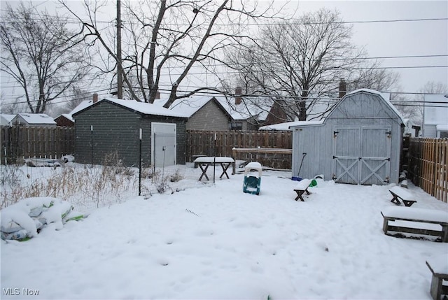 view of yard covered in snow