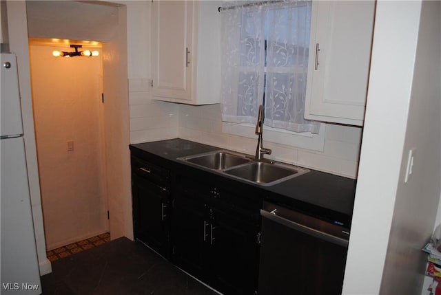 kitchen with sink, white cabinets, white fridge, decorative backsplash, and dishwashing machine