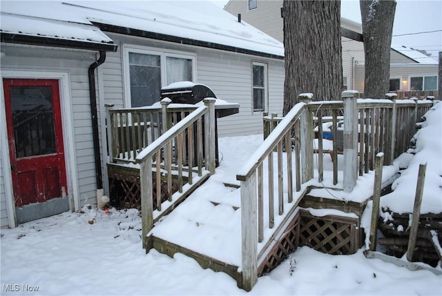 view of snow covered deck