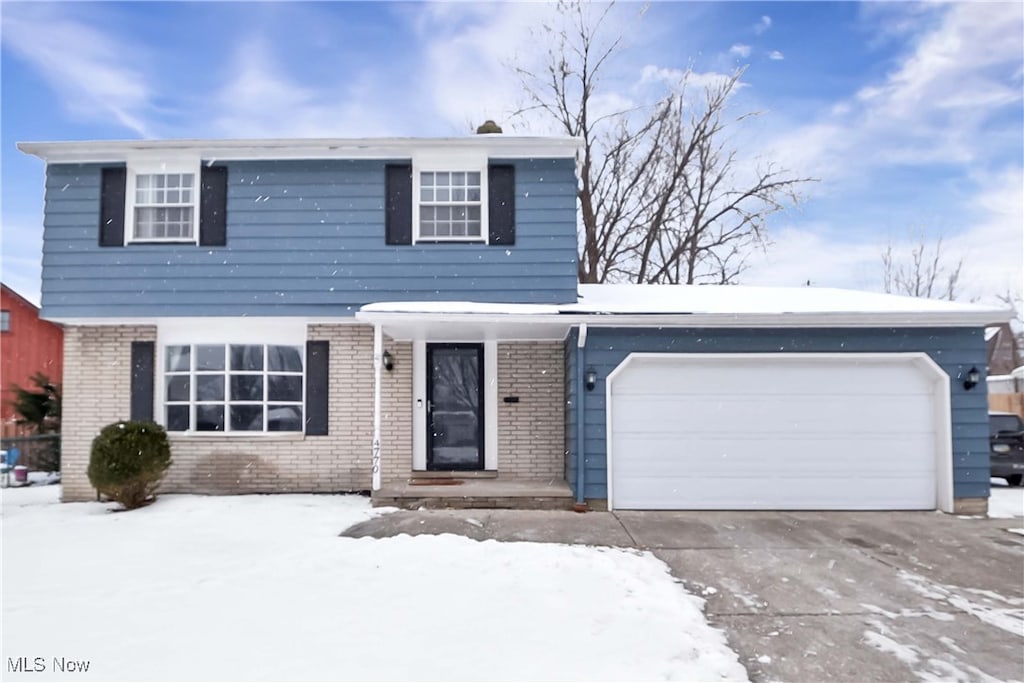 view of front of home with a garage