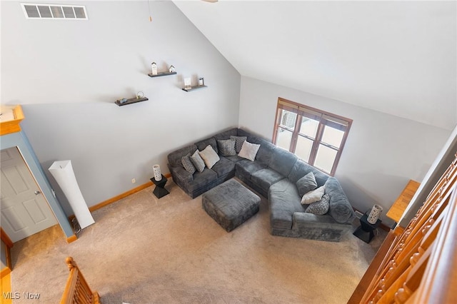 living room with lofted ceiling and carpet