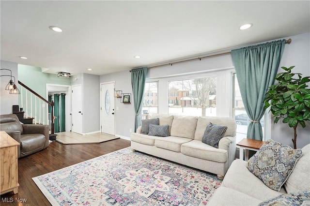 living room featuring dark wood-type flooring