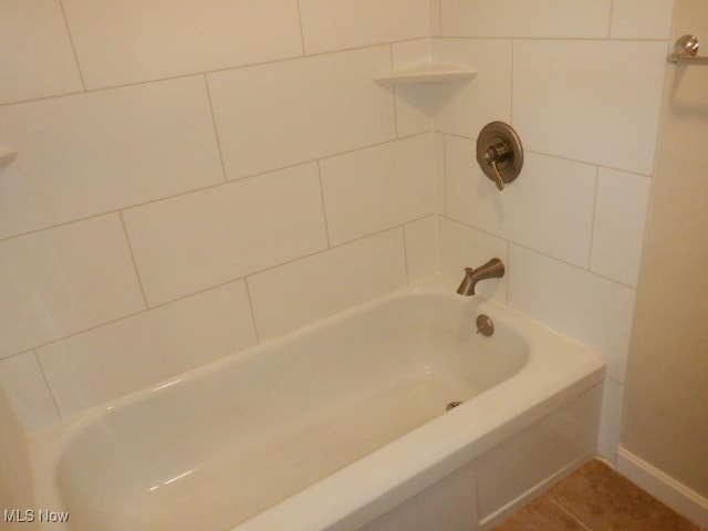 bathroom with tile patterned flooring