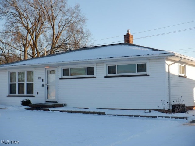 view of front of property featuring central air condition unit