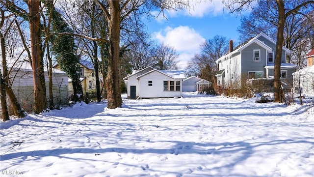 view of yard covered in snow