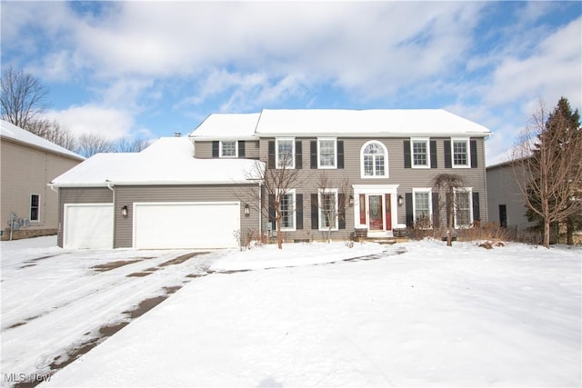 view of front of property featuring a garage