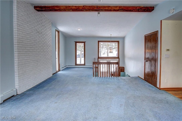 carpeted spare room featuring lofted ceiling with beams, brick wall, and baseboard heating