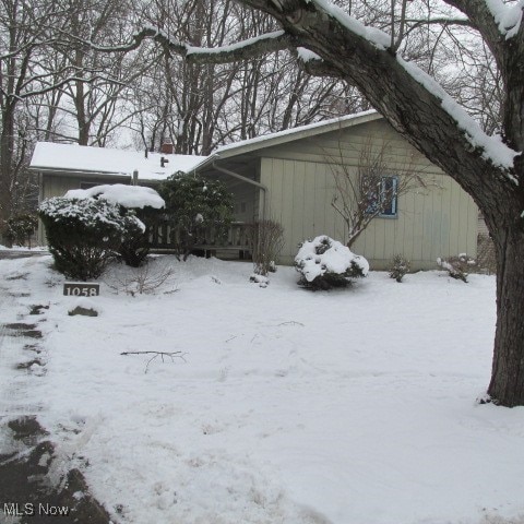 view of snow covered property