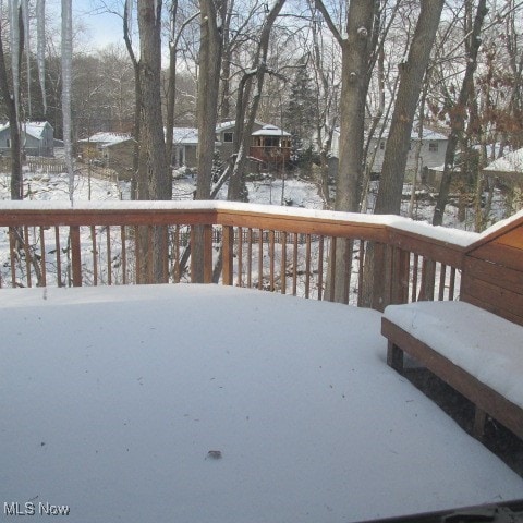 view of snow covered deck