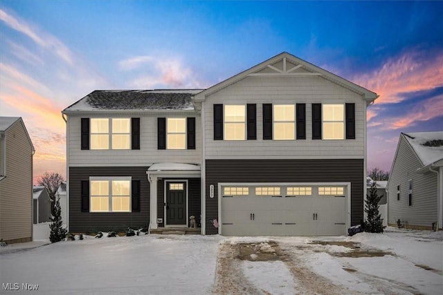 view of front of home featuring a garage