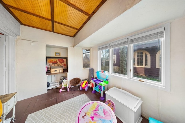 playroom featuring wood ceiling and dark hardwood / wood-style flooring