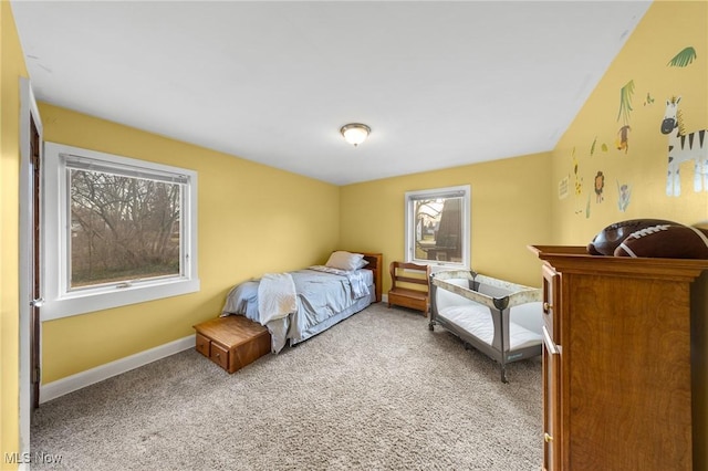 bedroom with light colored carpet